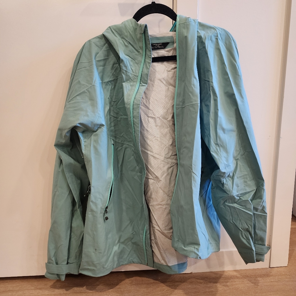 MEC teal rain jacket